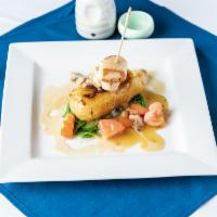 Grilled Chilean Sea Bass and Scallops Dinner · Hot and spicy.