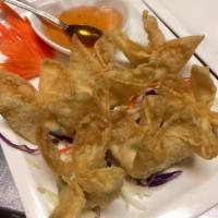 3. Crab cream cheese wonton (6 Pcs) · Fried cream cheese wontons, green onions served with sweet & sour sauce.