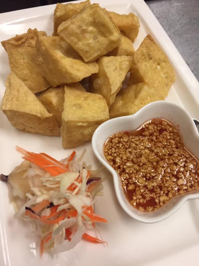 6. Fried Tofu · Golden-fried tofu served with tangy sweet sour sauce and sprinkled with crushed peanut.