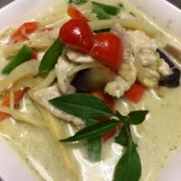 43. Green Curry  · Green beans, eggplant, bell pepper, bamboo shoots, and sweet basil simmered in coconut milk,...