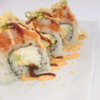 Louis Roll · IN: Crab, Avocado, Cucumber
OUT: Spicy Salmon, Green Onion, Shrimp Tempura, eel sauce and sp...