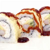 Crunch Roll · In : Crab, Avocado, Cucumber, Shrimp tempura 
Out : Tempura flake and eel sauce