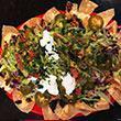 Nachos Locos · Chicken beef or combination nachos topped with cheese, black beans, lettuce, tomatoes, jalap...