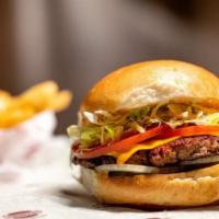 Classic Cheese Burger · Lettuce, tomato, raw or sauteed onions, pickles, mayonnaise, and American cheese on a fresh ...