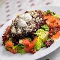 Black and Bleu Salad · Blackened Angus beef, crisp iceberg wedge, tomatoes, bleu cheese crumbles, smoked bacon, fre...