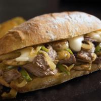 Philly Cheese Steak · Chopped up steak with sauteed onions and mozzarella. 