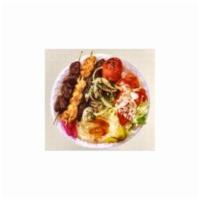 Combination Plate · Your choice of any 3 chicken or meat items. Served with rice, hummus, salad and pita bread. 