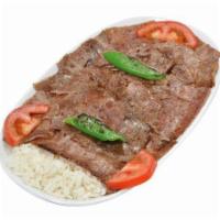 27.Lamb Gyro · Thinly sliced ground lamb seasoned with a mixture of Turkish spices and served with rice and...