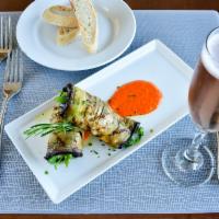 Melanzane  · Grilled eggplant stuffed with goat cheese, smoked salmon, arugula and pepper sauce. Gluten f...