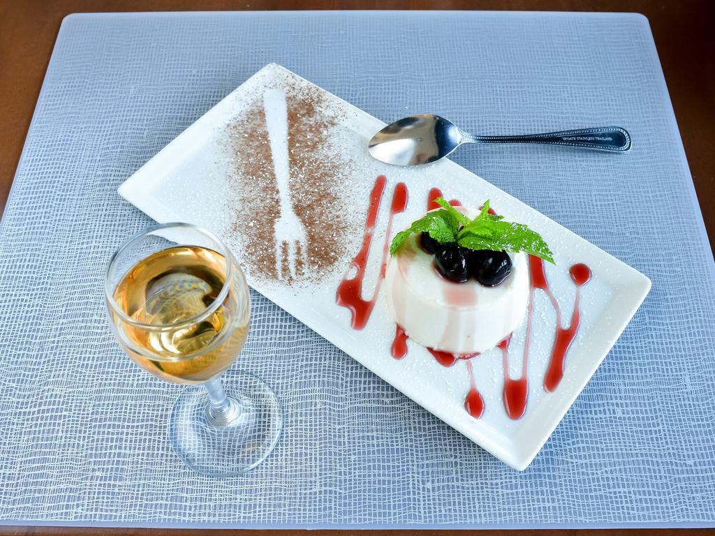 Panna Cotta all' Amarena · Vanilla eggless custard with Italian bing cherries.