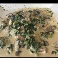Salmon Florentine · Atlantic Salmon Sautéed with mushroom, shallots, spinach in Alfredo sauce  and side of spagh...