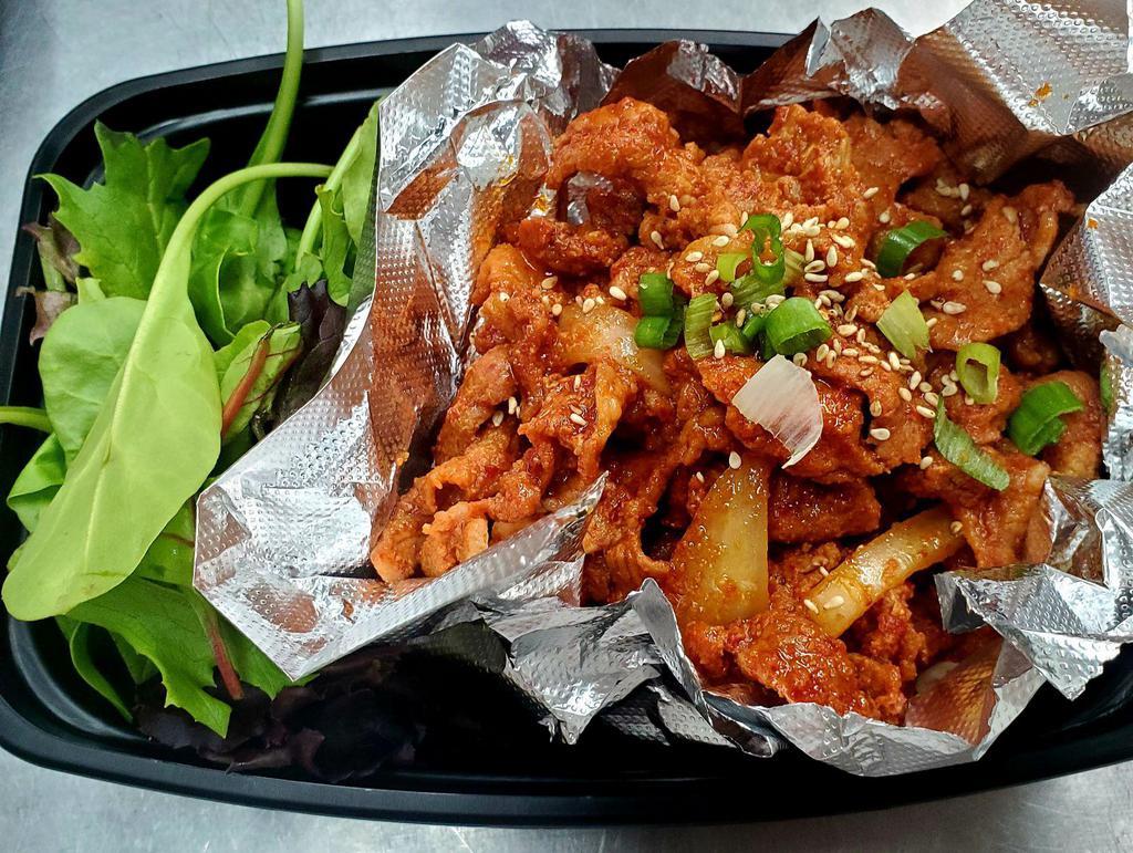 Pork Bul Go Gi · Thinly sliced pork marinated in a spicy red pepper sauce. 