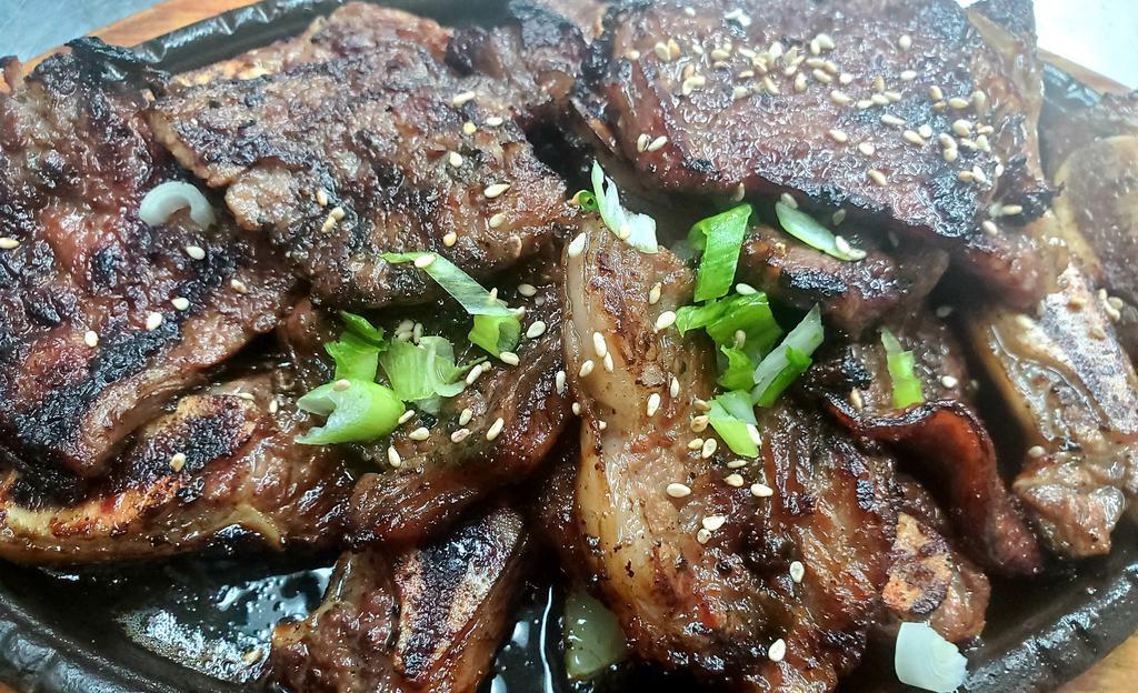 Gahl bee · Grilled beef spare ribs marinated in chef's secret sauce