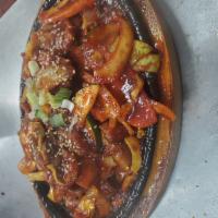 Hae Mul Bok Uhm · Hot and spicy stir fry seafood, shrimp, calamari and mussels.