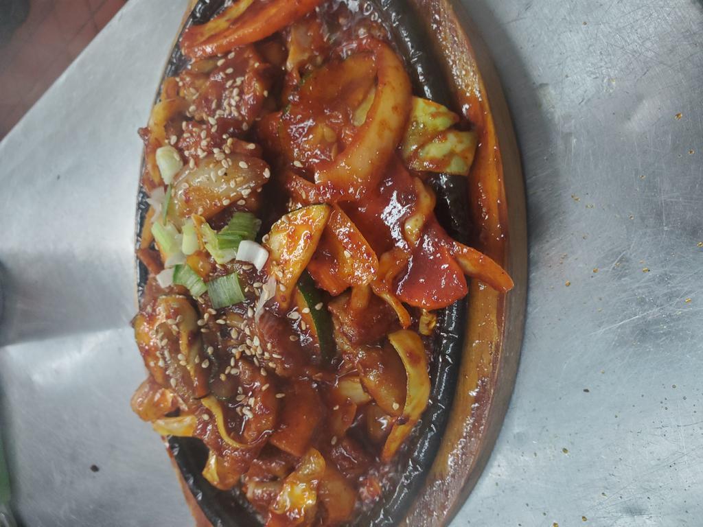 Hae Mul Bok Uhm · Hot and spicy stir fry seafood, shrimp, calamari and mussels.