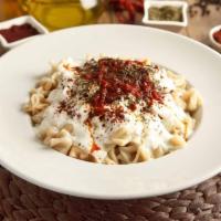 Turkish Dumplings - Manti · Poached beef dumpling with flavored oils and spices. Served with garlic yogurt on the side t...