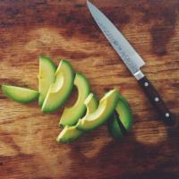 1/2 Avocado · Sliced avocado.