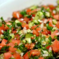 Shepherd Salad (Coban) · Finely chopped tomatoes, cucumbers, onions, and parsley.