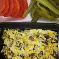 Potato & Egg Plate · Potatoes, eggs, pickles, tomatoes and pita bread.