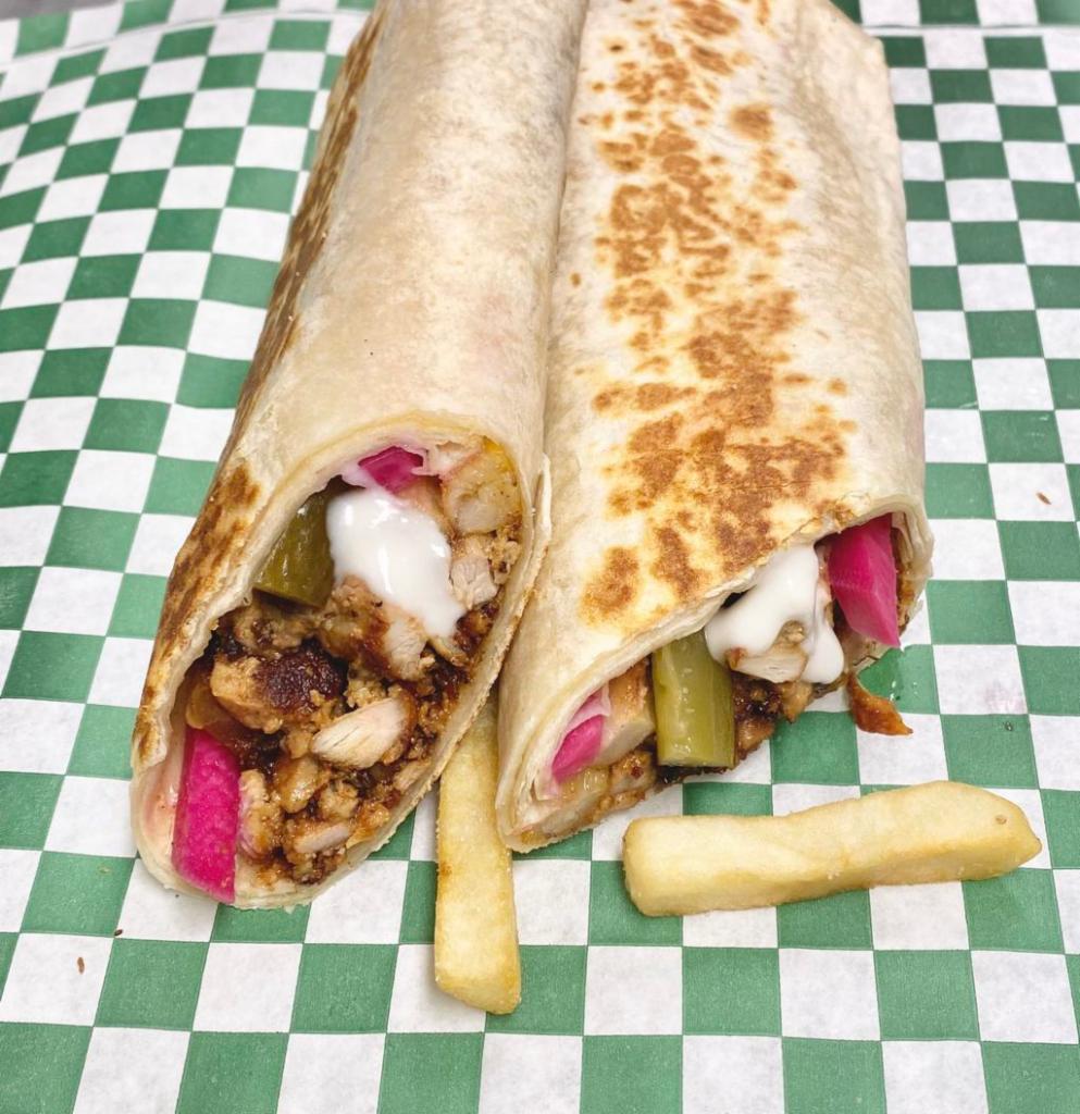 3. Chicken Wrap · Delicately marinated sliced chicken breasts served in 12