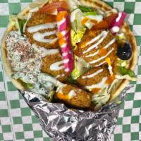 4. Falafel Gyro · Our falafel is made from scratch with garbanzo beans and spices served in hot pita bread. Se...