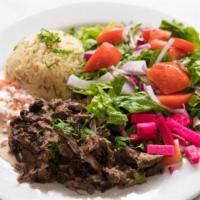 Beef Shawarma Plate · Local beef delicately sliced & seasoned in house.  Plate comes with house salad, fresh sauce...