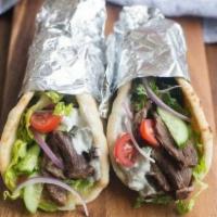 Beef Gyro  · Fresh local beef served in hot pita bread. Served with Tomatoes, lettuce, onions, green pepp...