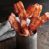 Maple Candied Bacon · Sweet, maple-glazed, and thick cut slabs of bacon.