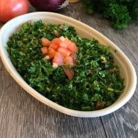 Tabbouleh  · Finely chopped parsley, cracked bulgur, chopped tomatoes and chopped green onions, seasoned ...