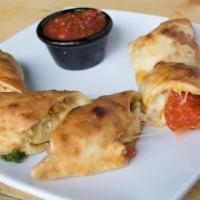 Pepperoni & Sausage Stromboli · Cheese, pepperoni, sausage and choice of 1 dipping sauce.