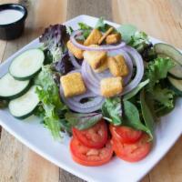 Classic House Salad · Mixed greens, tomatoes, red onions, cucumbers, croutons and choice of dressing.