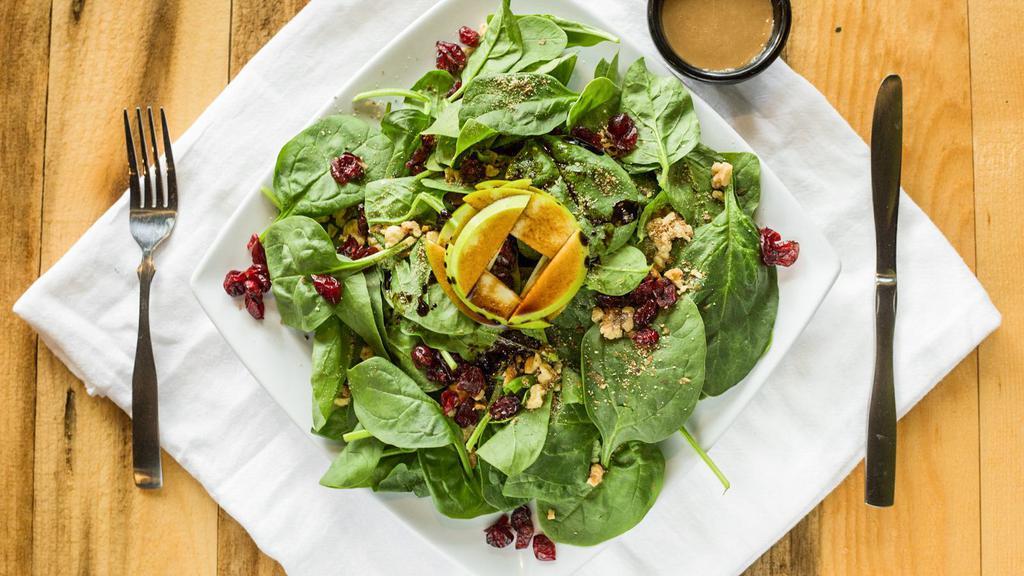 Spinach Walnut · spinach, toasted walnuts, sliced apples, dried cranberries, balsamic dressing (served on the side)