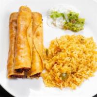 Flautas de Pollo · Deep-fried corn tortillas filled with seasoned chicken and Monterey Jack cheese served with ...