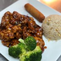 General Tso’s · Breaded and stir-fried with red chili peppers in a spicy brown sauce served with steamed bro...