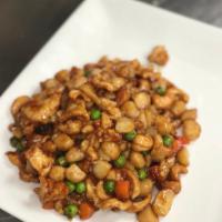 Cashew · Cashew nuts, green peas, carrots and water chestnuts stir-fried in a brown sauce.