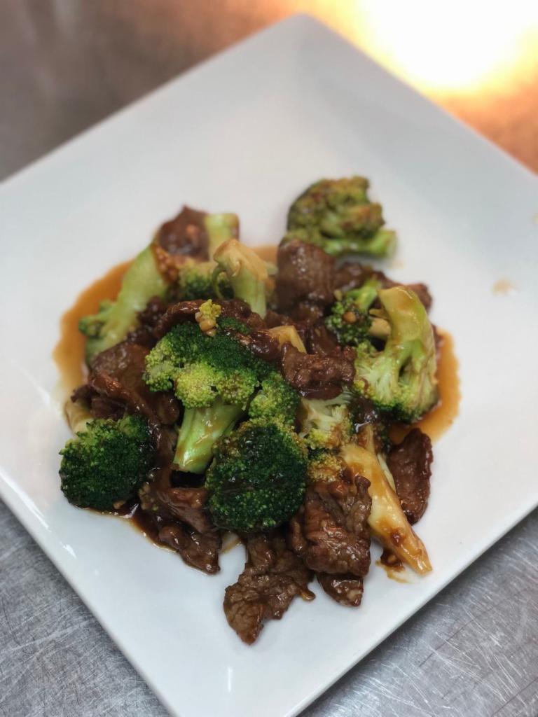 Classic Broccoli · Fresh broccoli stir-fried in a brown sauce.