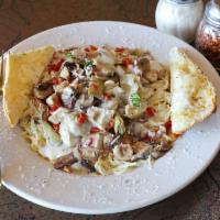 Mogio's Signature Chicken · Roasted chicken, artichoke hearts, sun-dried tomatoes and mushrooms tossed in Alfredo sauce ...