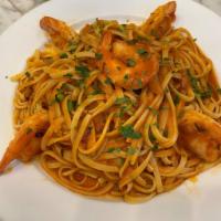 Fettuccini Shrimp Arrabiata  · Fettuccini pasta tossed with sautéed  shrimp in a spicy arrabiata sauce