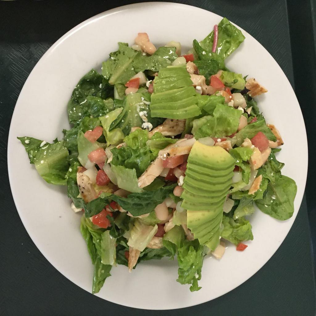 House Salad · Mixed greens, cannellini beans, tomato, cucumber, garnished with avocado and our house made Gorgonzola dressing...a truly delicious salad.