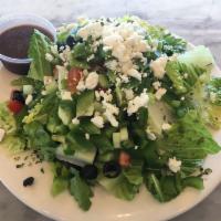 Greek Salad · romaine hearts, cucumbers, tomatoes, red onion, bell pepper, feta cheese, black olives house...