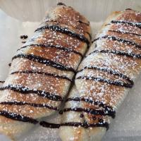 Nutella Rotalini · Our amazing dough filled with Nutella and baked.