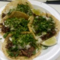 4 Barbacoa Street Tacos · Onion and cilantro. Slow cooked over an open flame.
