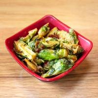 Crispy Brussels Sprouts · Deep-fried brussels sprouts glazed with sweet red chili sauce.