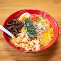 Spicy Kimchi Ramen Noodles · Spicy creamy pork broth, kimchi, roasted pork, wheat noodles, sweet corn, black mushroom, ba...