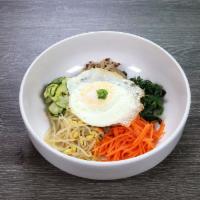 Bibimbap · Bulgogi, carrots, bean sprouts, spinach, mushroom, squash, fried egg over easy and rice.