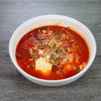 Yukgaejang · Spicy soup w/ shredded beef brisket, egg, green onions, bean sprouts, royal fern, enoki mush...