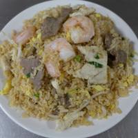 Panda Deluxe Fried Rice · Shrimp, beef & chicken. Gluten-free available for an additional charge.