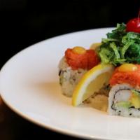 Hawaii Roll · Shrimp tempura, cucumber,avocado, cream cheese,mango inside topped with spicy kani, crunchy ...