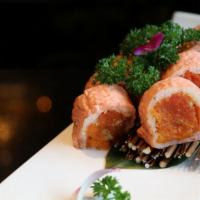 Spicy Mama Roll · Spicy tuna, spicy salmon, spicy yellow tail, crunchy inside wrapped with pink soy paper and ...