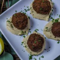 Falafel Appetizer (6) · Vegetarian falafel made from garbanzo bean, and spices.  Served on top of humus with tomato,...